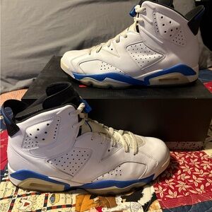 Air Jordan 6 Retro "Sport Blue" sneaker in white leather.